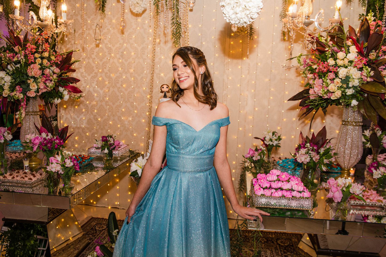 Woman in Blue Dress Standing Beside Pink Flowers