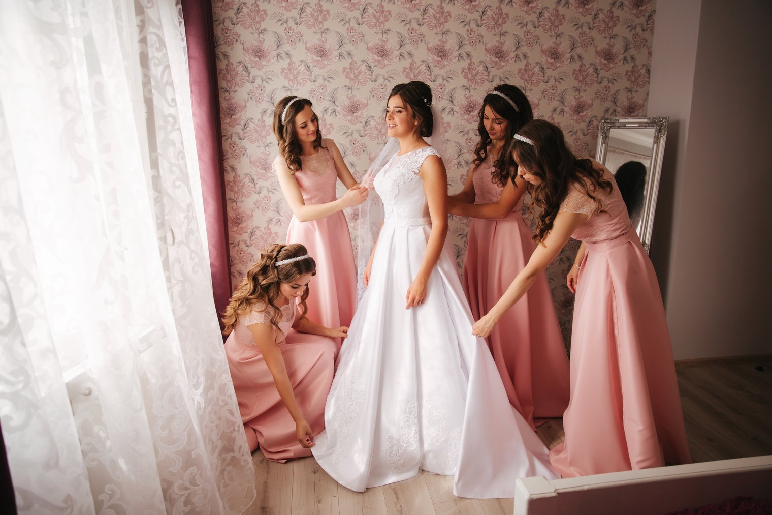 Bridesmaids Assisting the Bride 